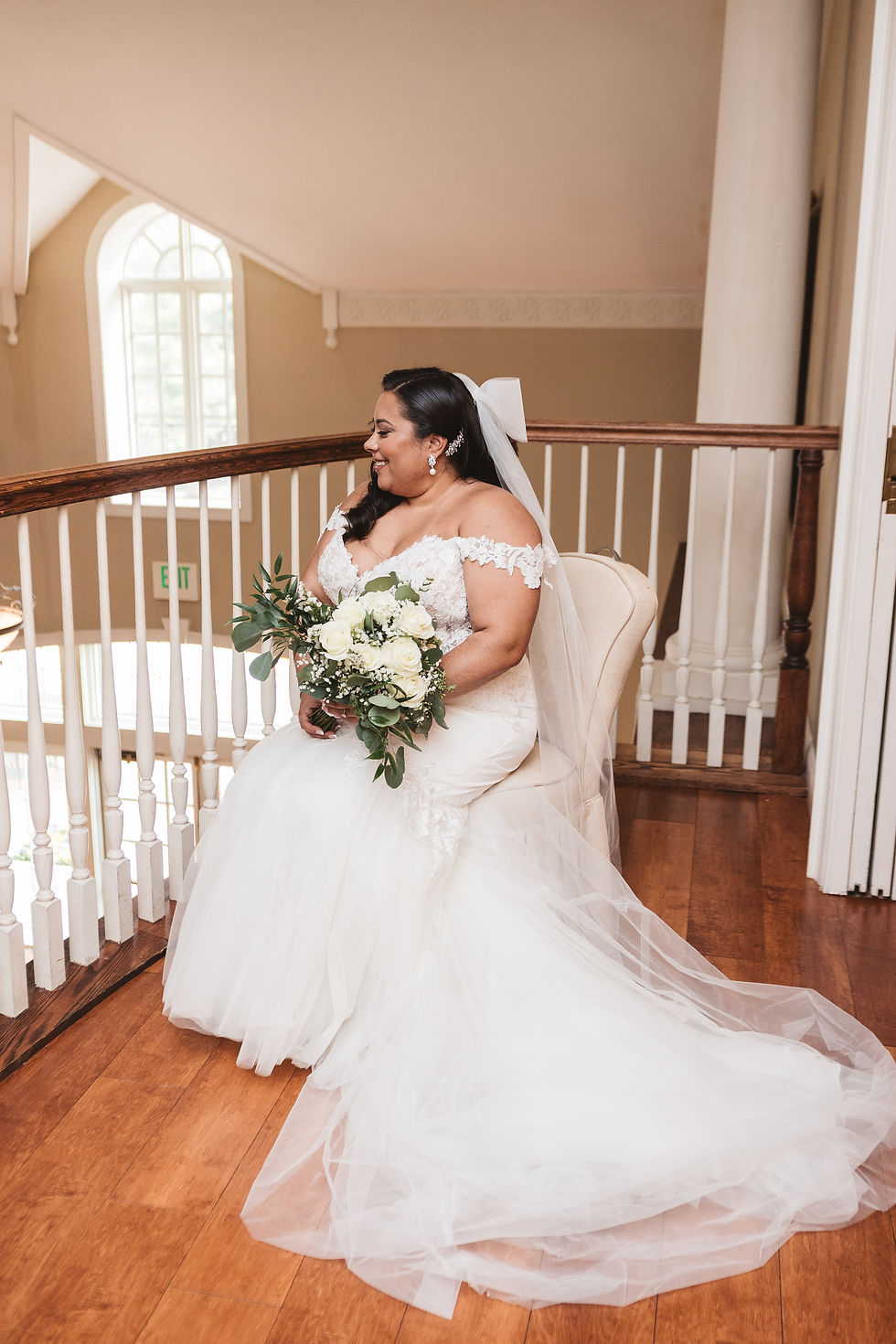 Bride in gown and veil holding bouquet photographed for Philadelphia wedding day at Belle Voir Manor. Taken by Philly wedding photographer Madison Neumann Photography.