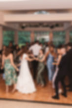 Wedding guests join bride and groom on dance floor for Pennsylvania wedding in the Pocono Mountains. Photographed by South Jersey Philly Wedding Photographer Madison Neumann Photography.