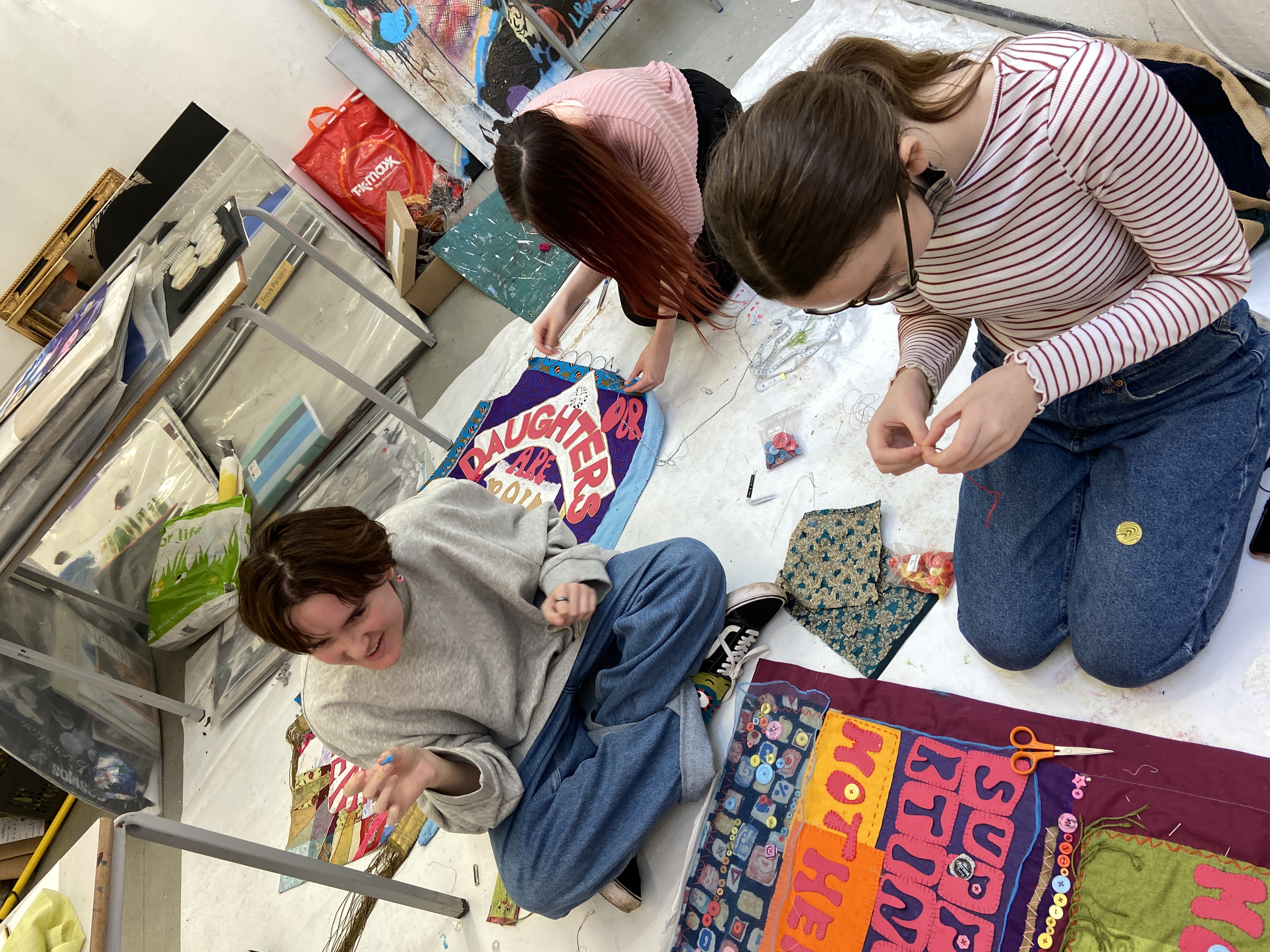 Foundation art students testing individual textile banner making at King Edward VI College in Nuneaton.