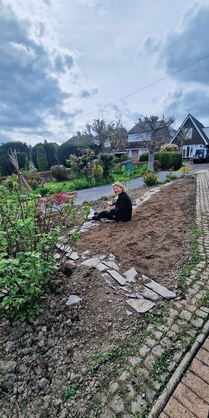 Working in public while preparing soil for a community flax project in Riddings, Derbyshire