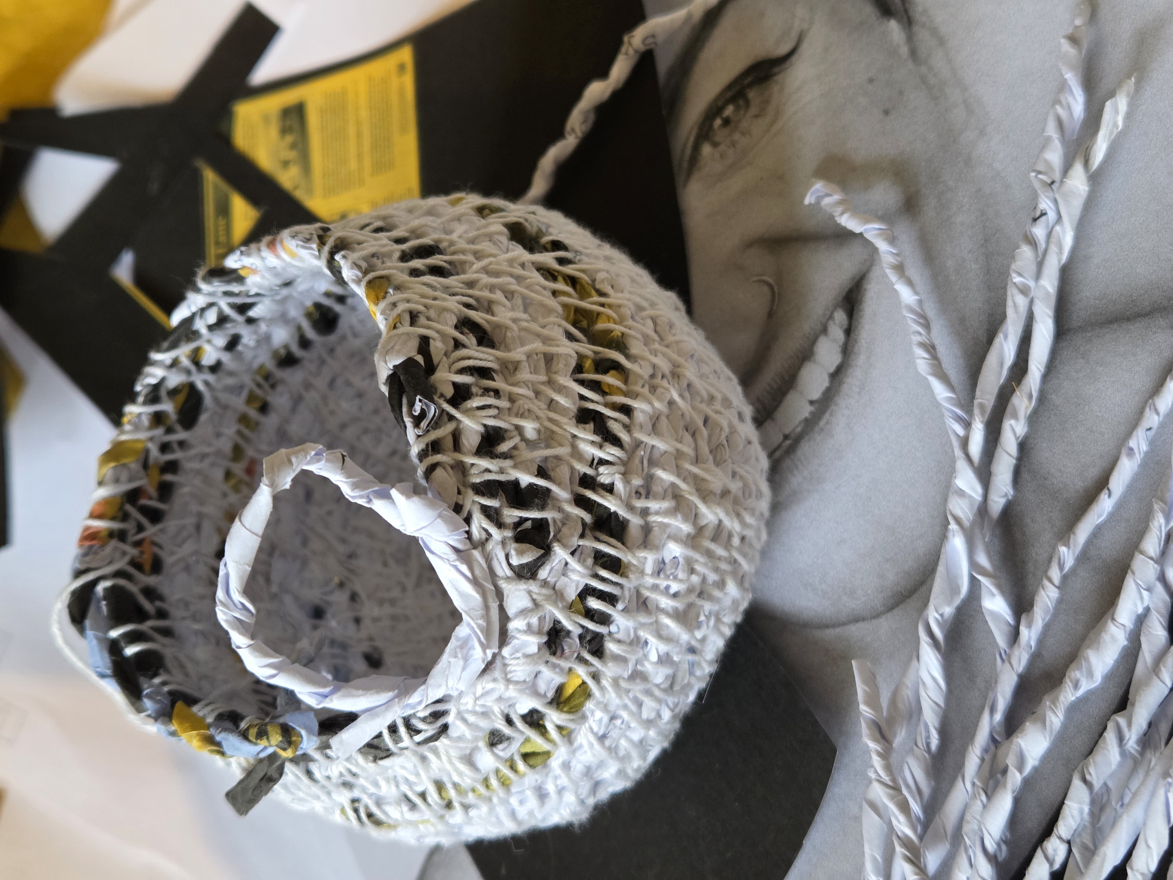 Handmade paper cord vessel created from rejected Derbyshire Supergirl photocopies during the Creative Listener project in Derbyshire.