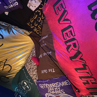 Hand painted textile banners covering the roof of Array Collective’s síbín during Turner Prize 2021