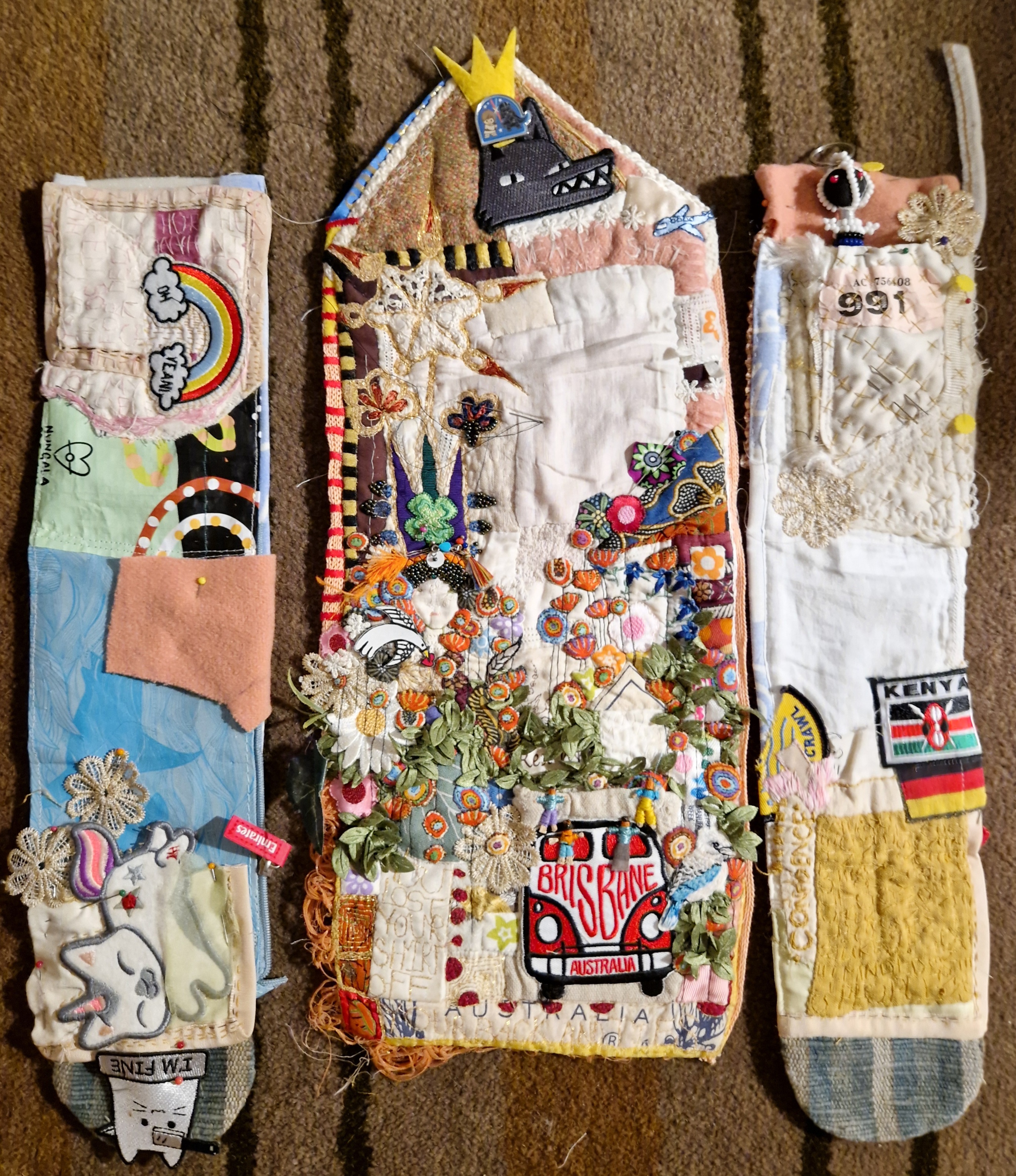 Phoenix From The Bin in progress, showing layers of found and stitched materials.