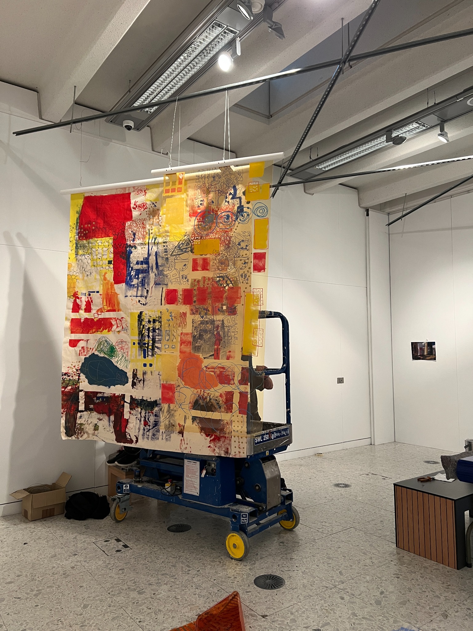Mim’s large collaborative Work On Walls hanging being installed at the Herbert Art Gallery & Museum in Coventry.