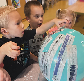 Young Preschoolers making an experiment
