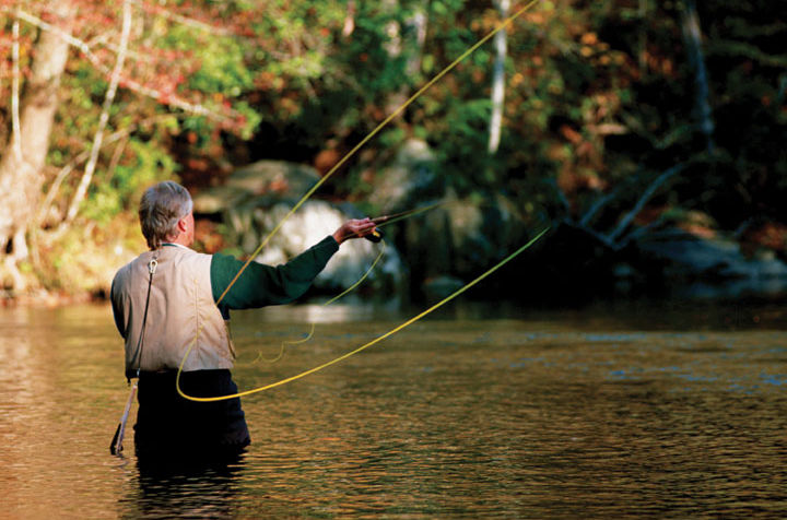 A man fly fishing in a North Georgia