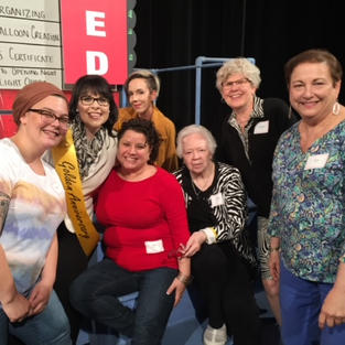 Lori enjoying her time as an auctioneer with volunteers at the 50th Anniversary WVIZ/PBS Televised Auction