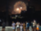 Crowd on a Makati bridge watching fireworks during New Year's Eve. Roy Romarate street photography.