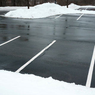 Empty parking lot with snow removed