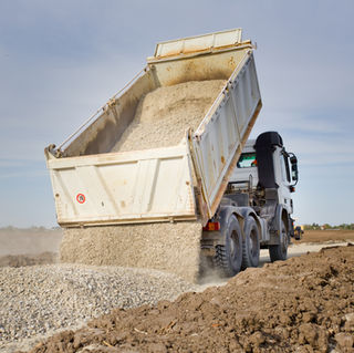 Truck tipping gravel