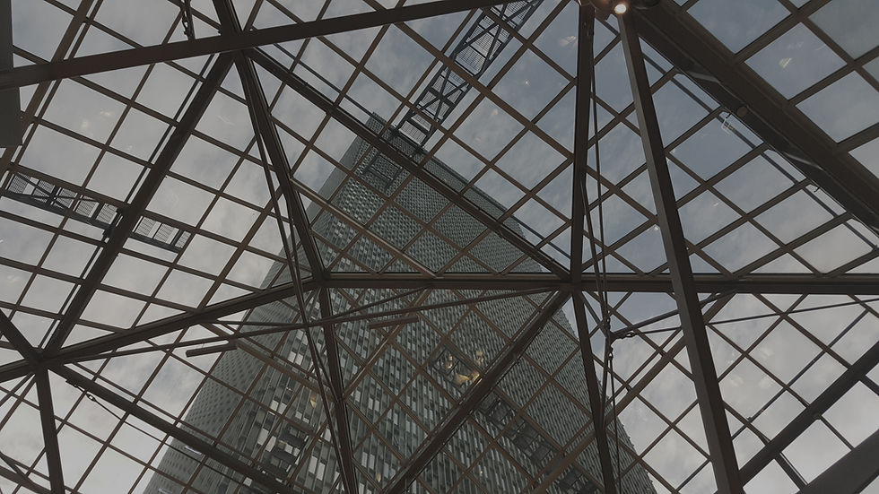 Geometric glass ceiling of corporate center, symbolizing structured executive communications strategy