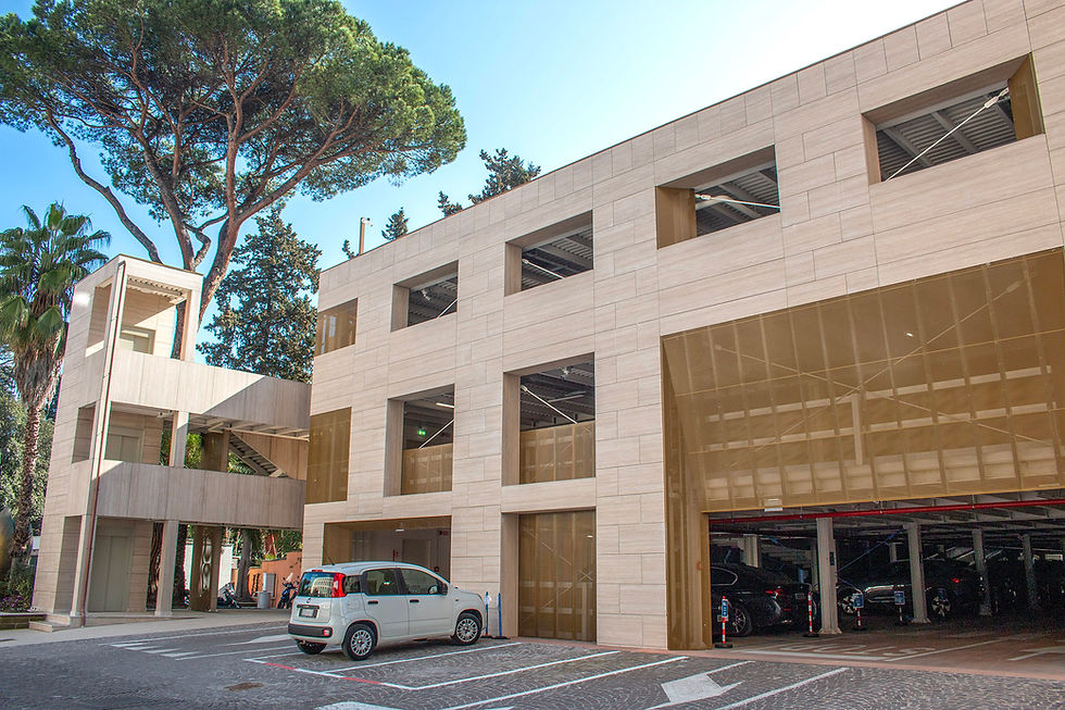 Parcheggio multipiano FAO a Roma con facciata ventilata in ceramica e lamiera forata.