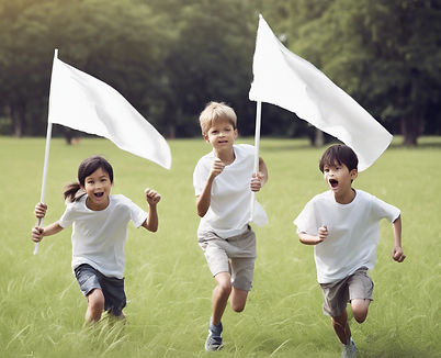 capture the flag kids show a white flag on a grass field.jpg