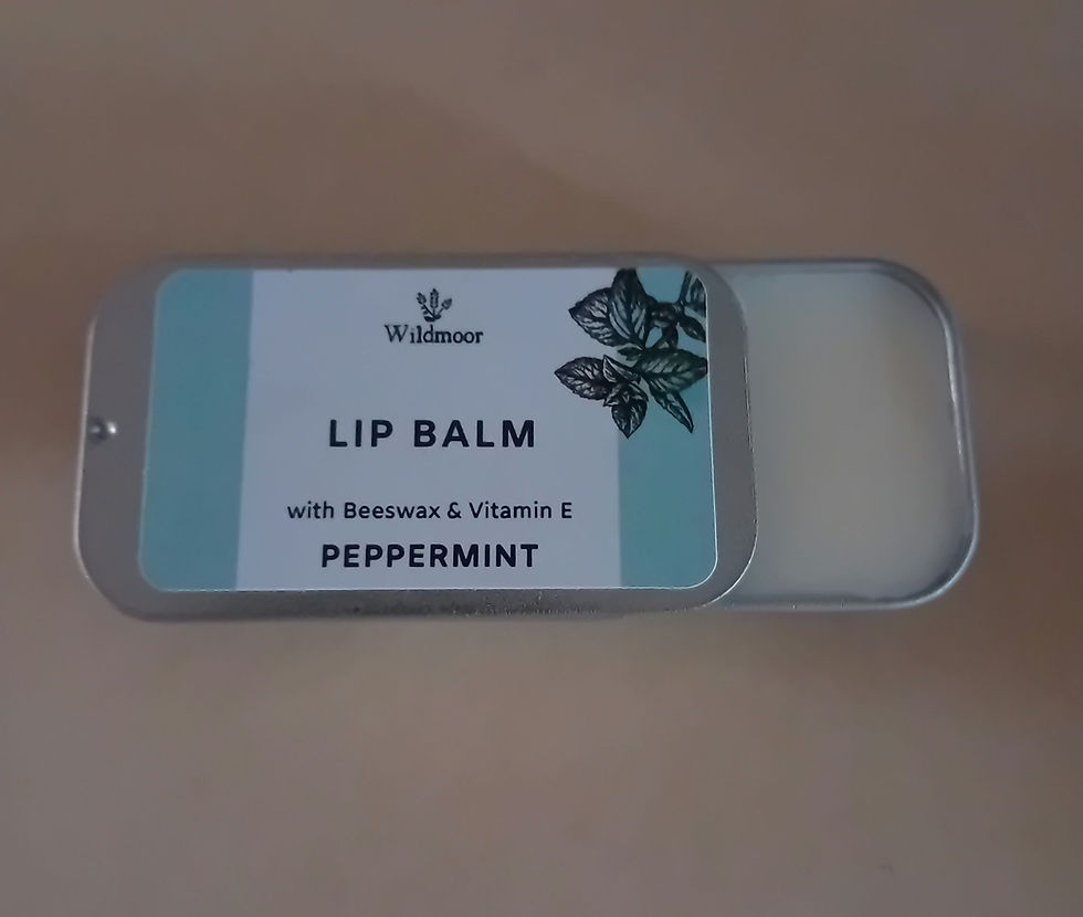 Thumbnail: peppermint lip balm open lid