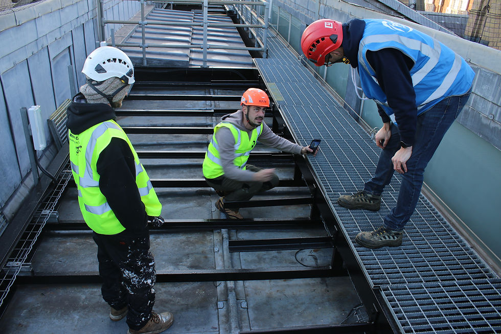 Proaltus Rope Access Operatives Completing a Glazing Install on a High Rise Building