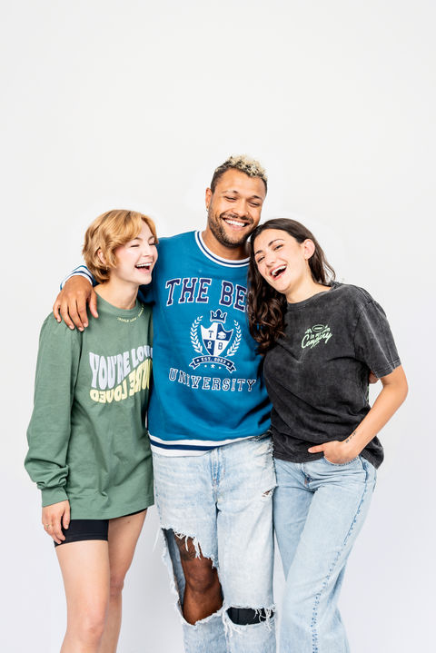 kallmekris posing with two models in Otto sweatshirts in front of white wall
