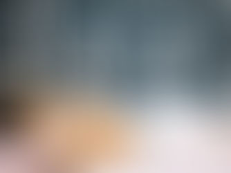 Young girl lying awake in bed at night, looking restless and unable to sleep, suggesting difficulty with sleep or anxiety.