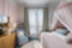 child's bedroom with muted pastel tones