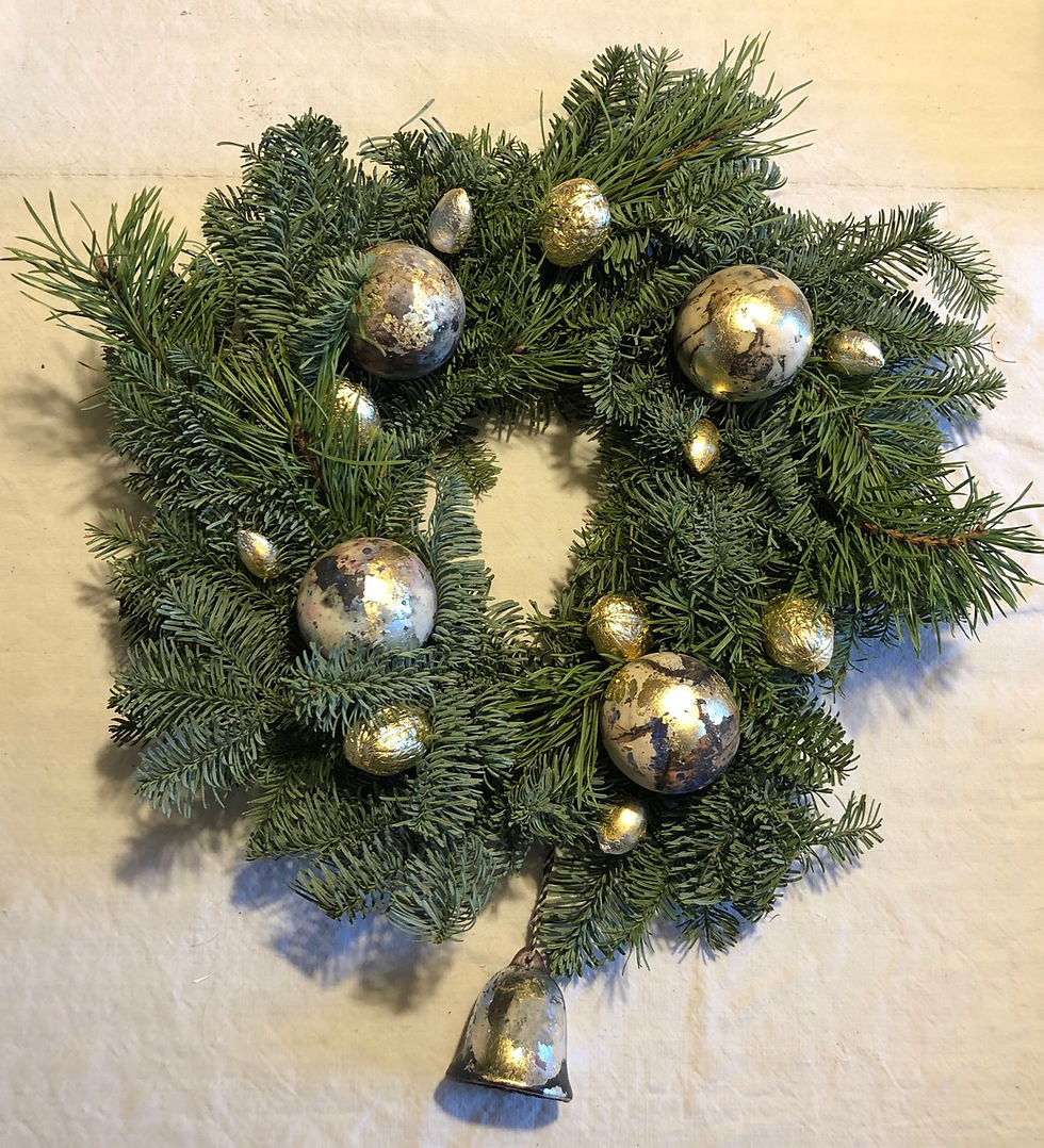 Wreath with gilded nuts and barrel fired baubles £55