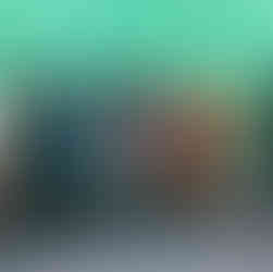 podium with three males holding trophies 