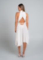 Thumbnail: Back view of Sheer Devotion dress crafted in white double georgette, featuring a softly draped open back, a fine waist belt and a fluid midi skirt that falls effortlessly with the body, designed by FLUID the Label Australia
