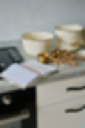 Photo by Derya Nur POLAT: https://www.pexels.com/photo/modern-kitchen-with-baking-supplies-and-notebook-33669382/