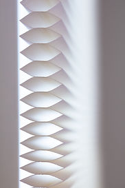 Light coming through soft paper shade or blind. Extremely shallow depth of field..jpg