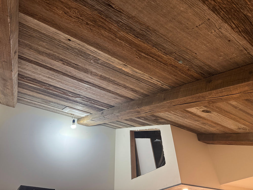 Northern Michigan reclaimed barnwood ceiling and beams