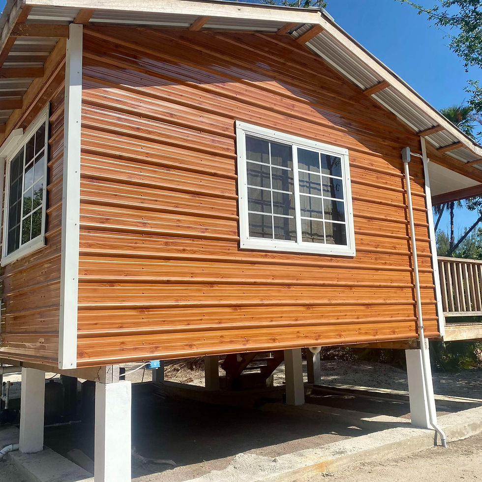 Charming exterior view of Cashew Tree Cabana in Maya Beach, Belize