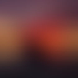 Kayaker raises paddle triumphantly against a vibrant red and purple sunset over calm water, creating a serene and triumphant mood