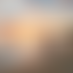 Family walking along a quiet beach in Placencia Belize at sunset