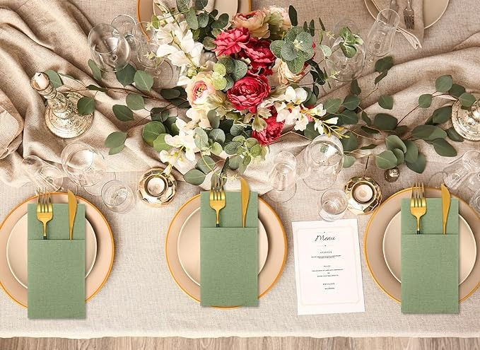 Elegant table setting with floral arrangement and menu cards, ready for dining.