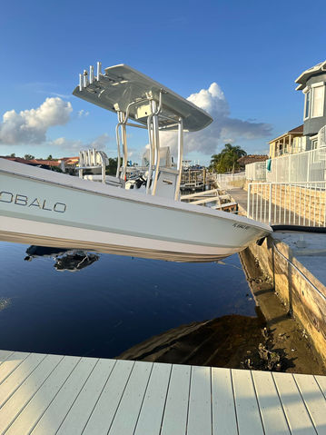 Boat was pushed off the lift during the storm surge. Specialty dock solutions was able to hook up a generator to power the lift and drop the boat back in the water