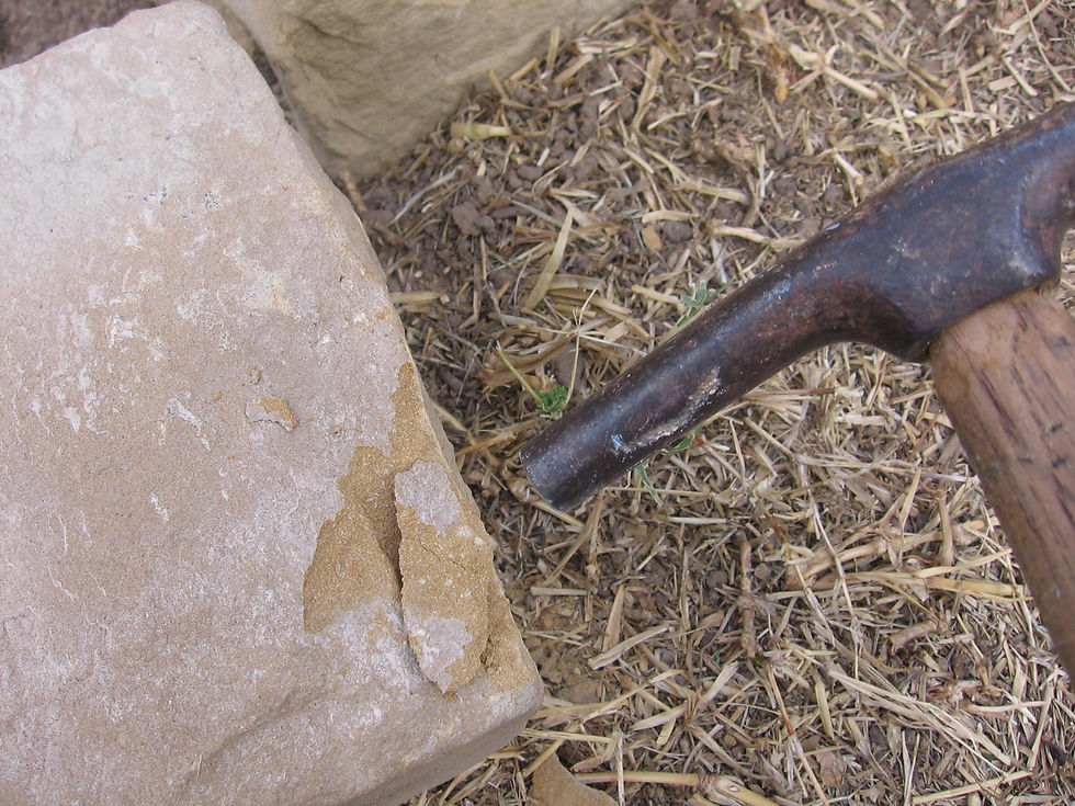 Sometimes I had to chip away bits of stone for a better fit. Fortunately, sandstone is fairly easy to work with and shape.
