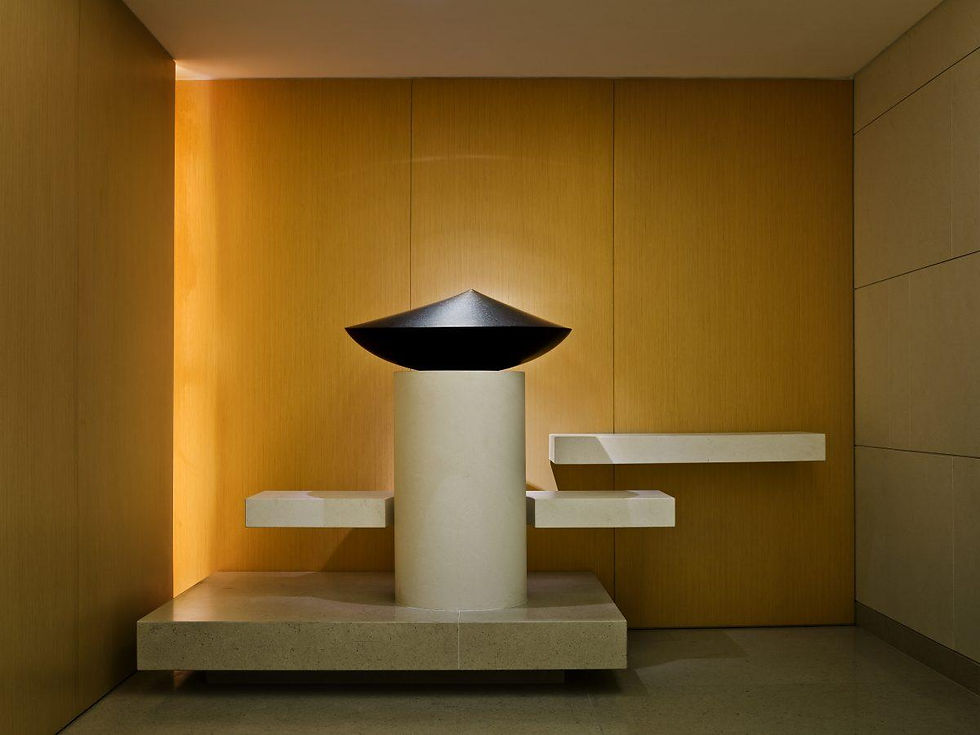 Artist Armen Agop’s granite work Silence as seen off the Level 6 Lift.