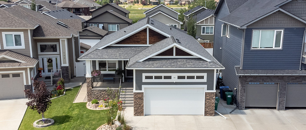 Aerial view of a bungalow by a real estate photographer.