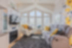 Bright living room shot by a real estate photographer.