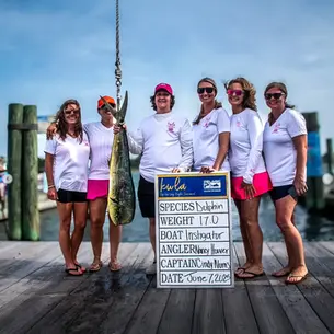 Group of  fisherwomen standing on the decks and came at 11th place out of 224 boats for the Dolphin category of the Big Rock Keli Wagner Lady Angler tournament. 