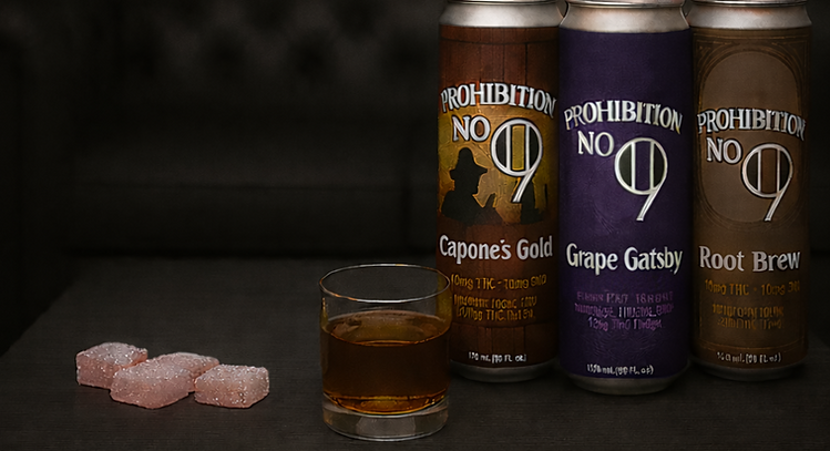 3 cans on coffee table with glass and gu