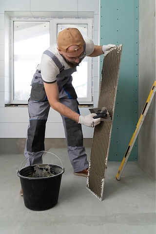 tiler-working-renovation-apartment.jpg