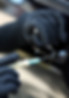 A professional locksmith unlocking a car door, providing 24/7 emergency auto locksmith services in Revere, MA.