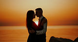 romantic-young-couple-embrace-at-colorful-sunset-2026-01-06-10-43-26-utc-200kb_edited_edit
