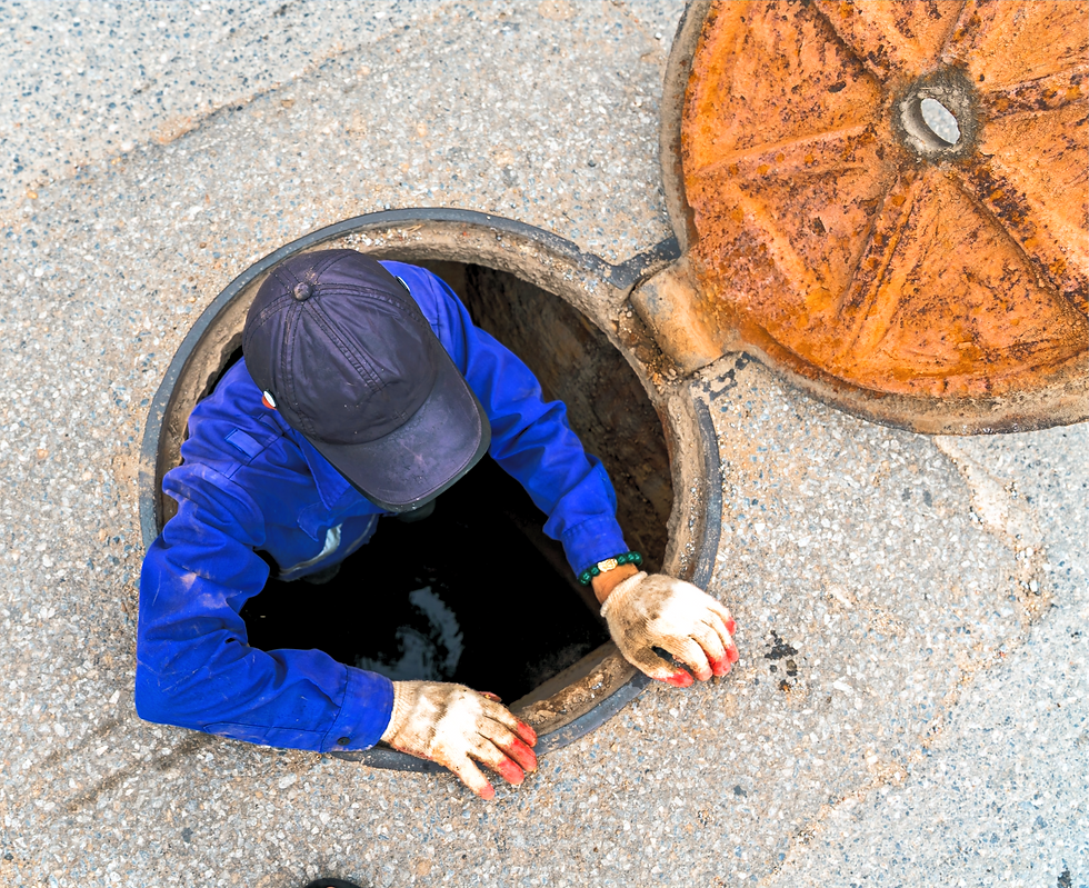 Worker in Manhole