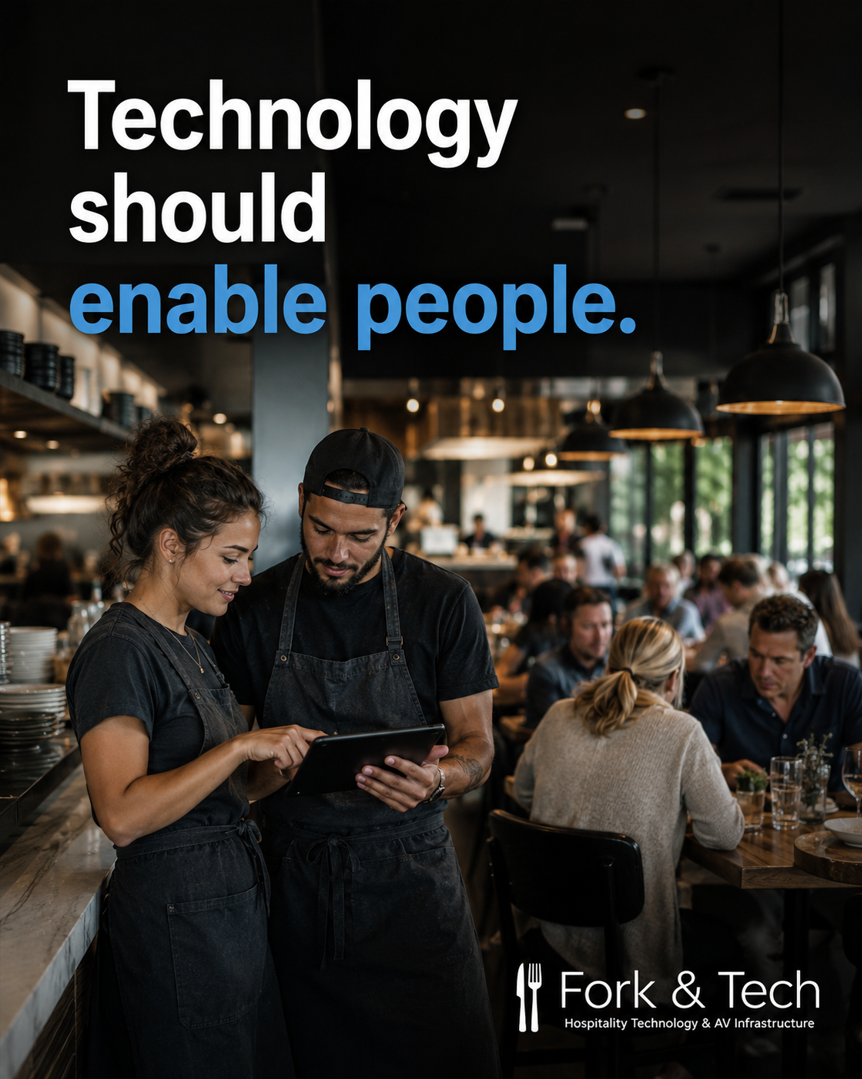 Restaurant employees using technology to support the guest experience.
