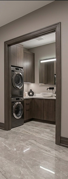 basement with marble floors and laudry room.png
