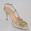 Thumbnail: Gold Leather Stiletto adjustable slingback Pump; with front emblem design 