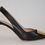 Thumbnail: Black Leather Slingback  Stiletto Pump with a gold metallic front buckle