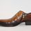 Thumbnail: Brown Leather dress shoe with folded leather design, upper button clasps and side zipper