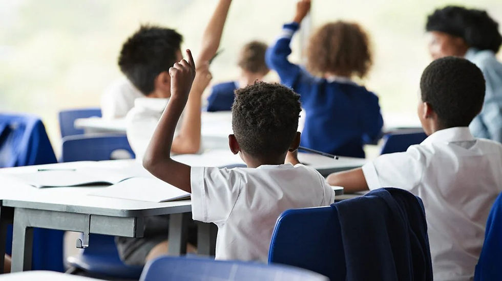 elementary-school-children-raising-hands-classroom-1296x728-header-1024x575.jpg