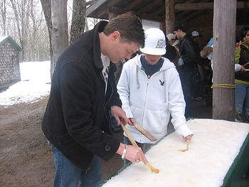 One of our hockey trips...learning to make Maple Syrup
